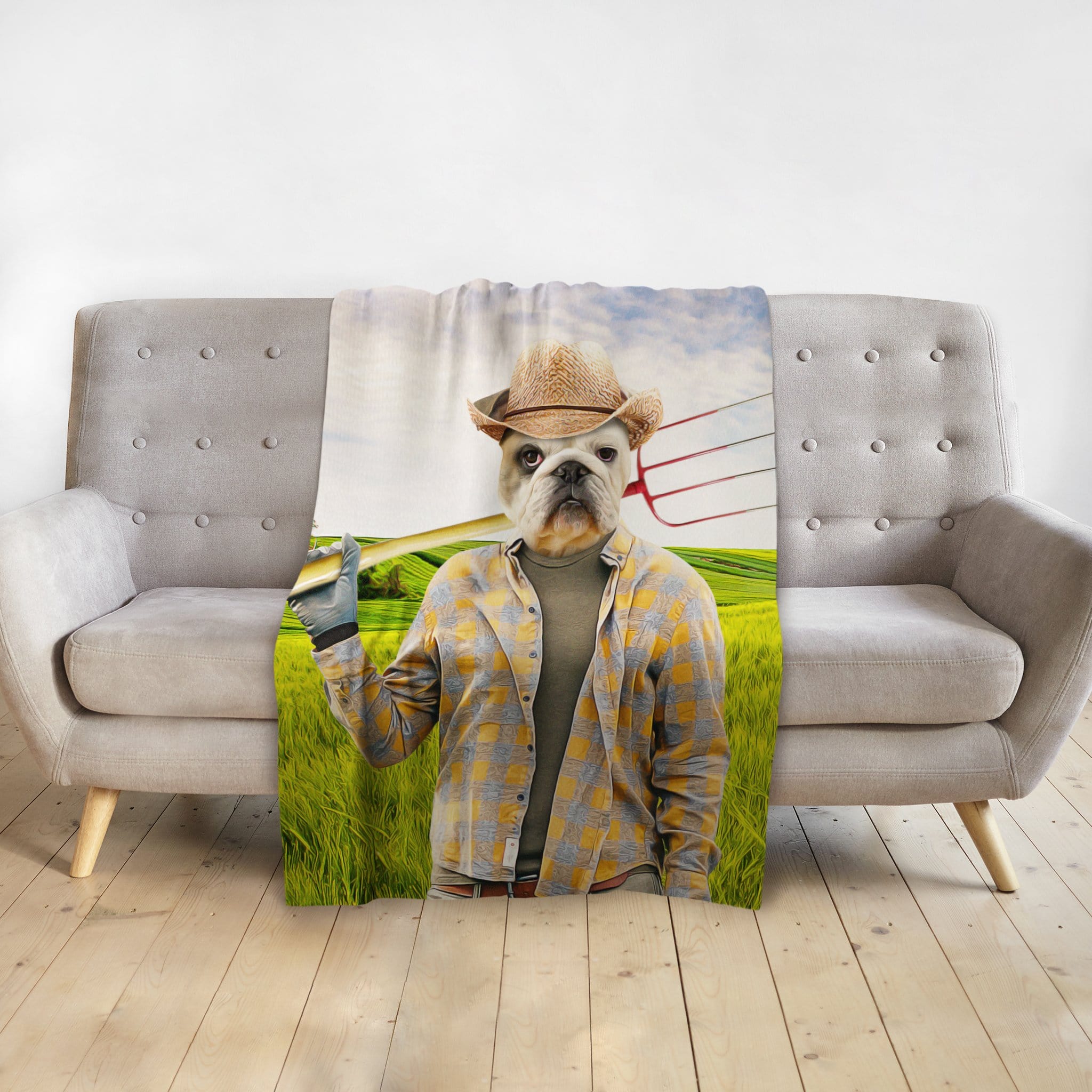 Personalized pet blanket with a French Bulldog's head on a farmer's body in a green field.