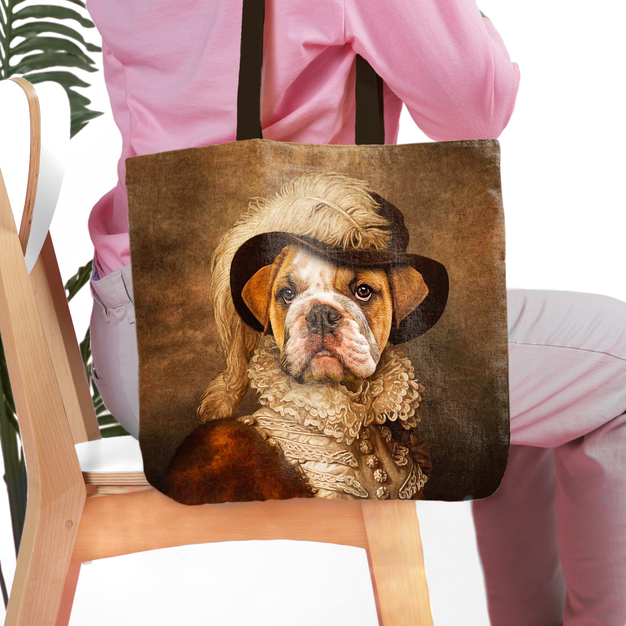 Personalized tote bag with a custom renaissance portrait of a bulldog in a feathered hat.