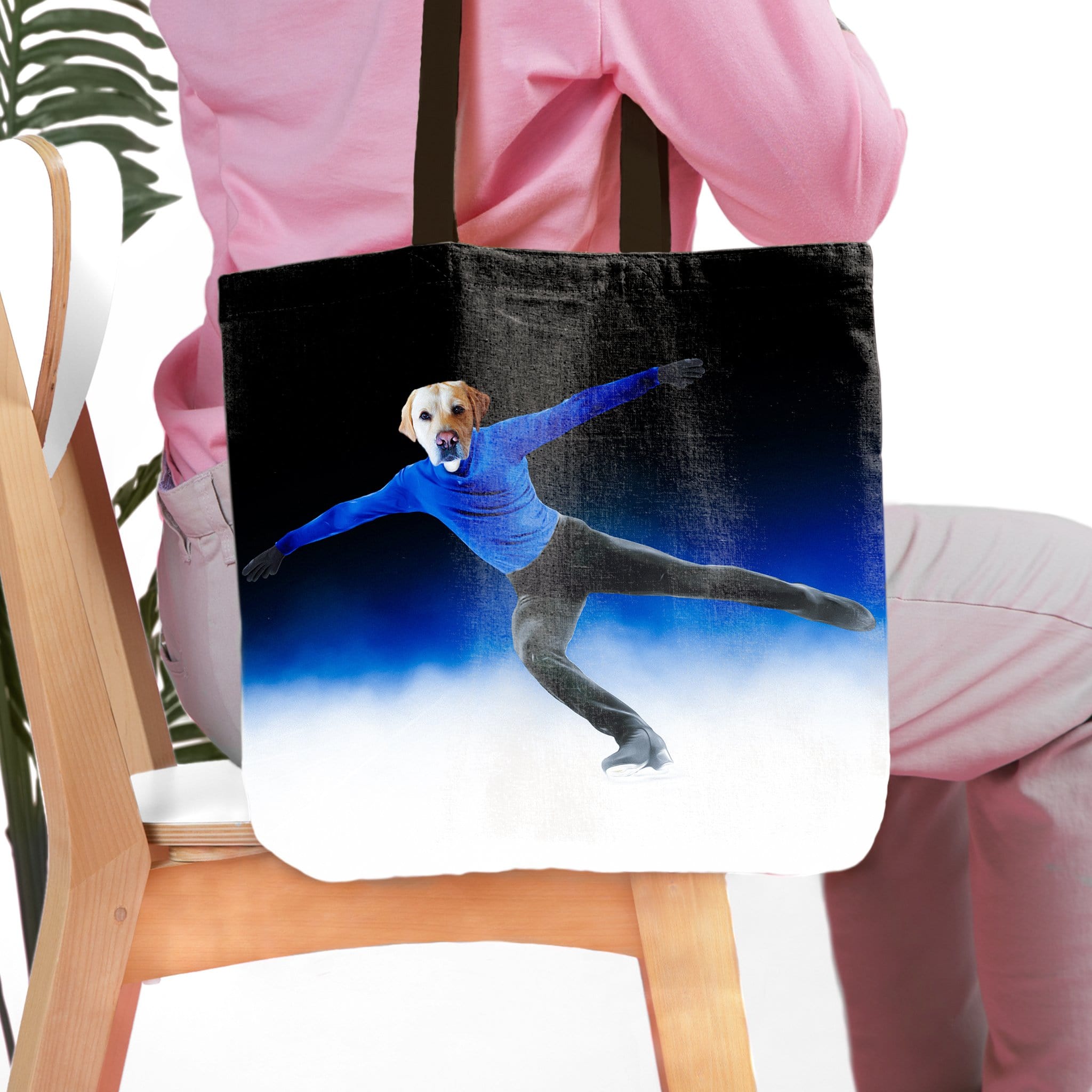 Personalized black tote bag with a custom dog pet portrait as a figure skater on ice.