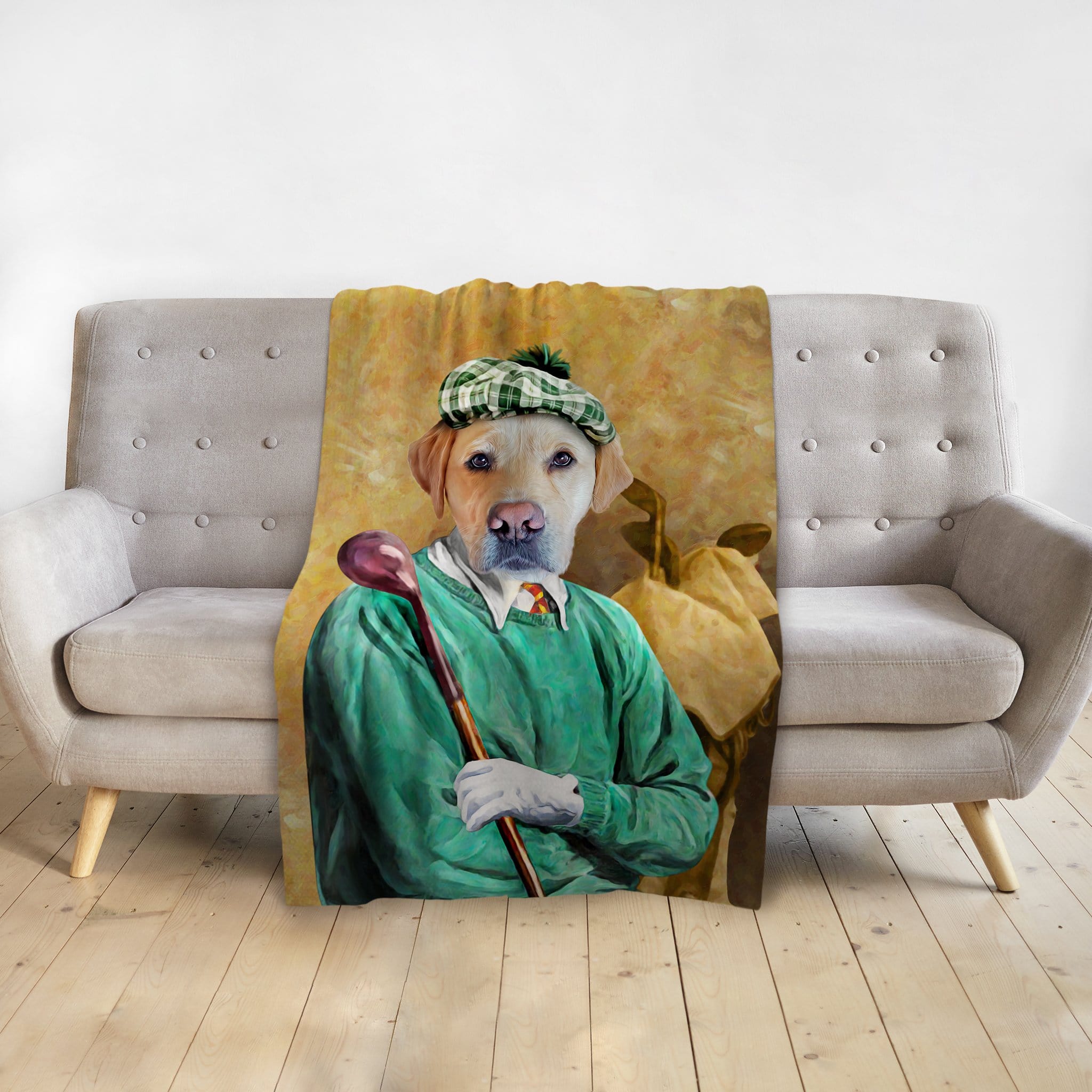 Personalized pet blanket with a golden retriever in a golfer portrait, green sweater and plaid hat.