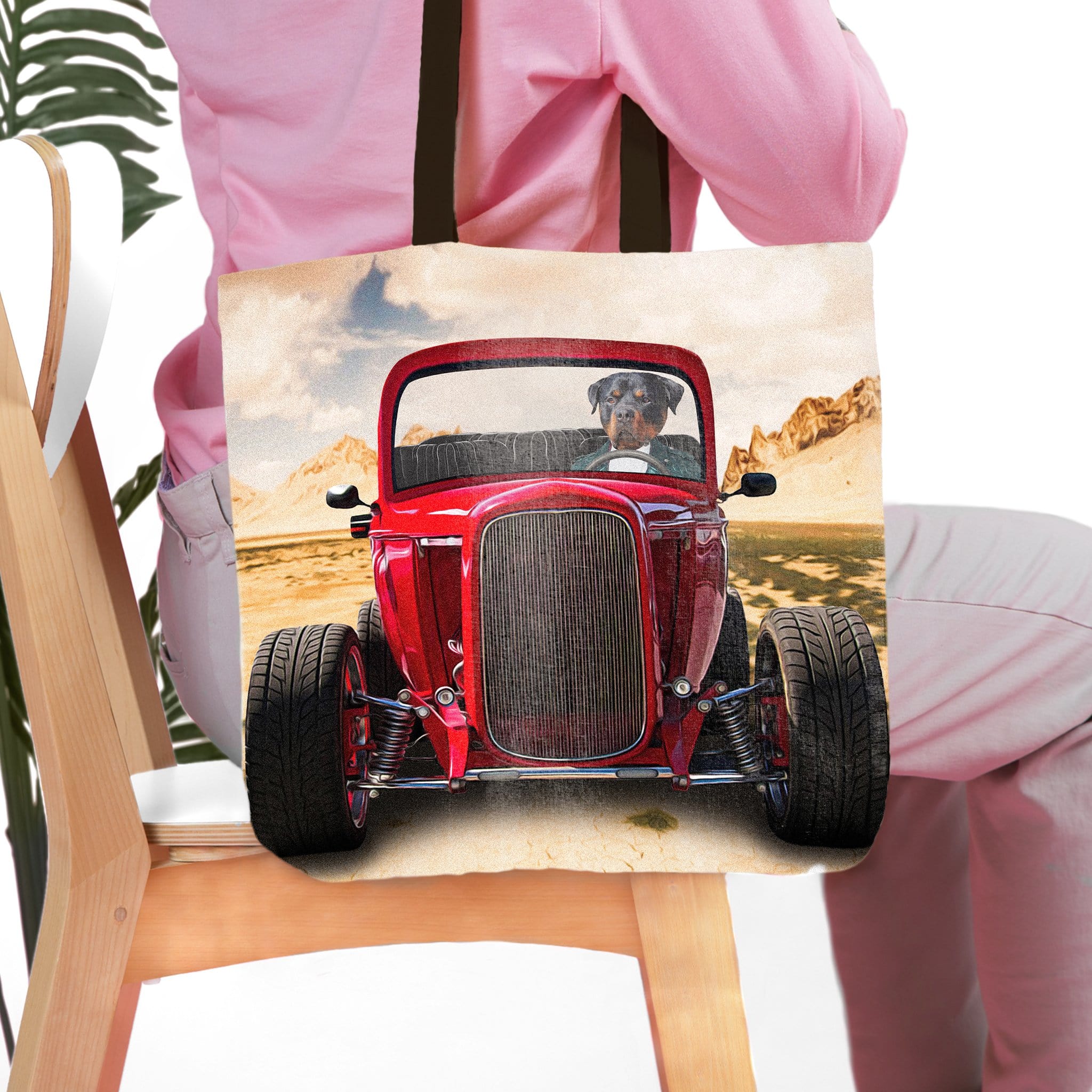 Personalized tote bag with a custom pet portrait of a dog driving a red hot rod car.