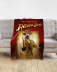Personalized pet blanket with a French Bulldog in an Indiana Jones-style portrait, red background.