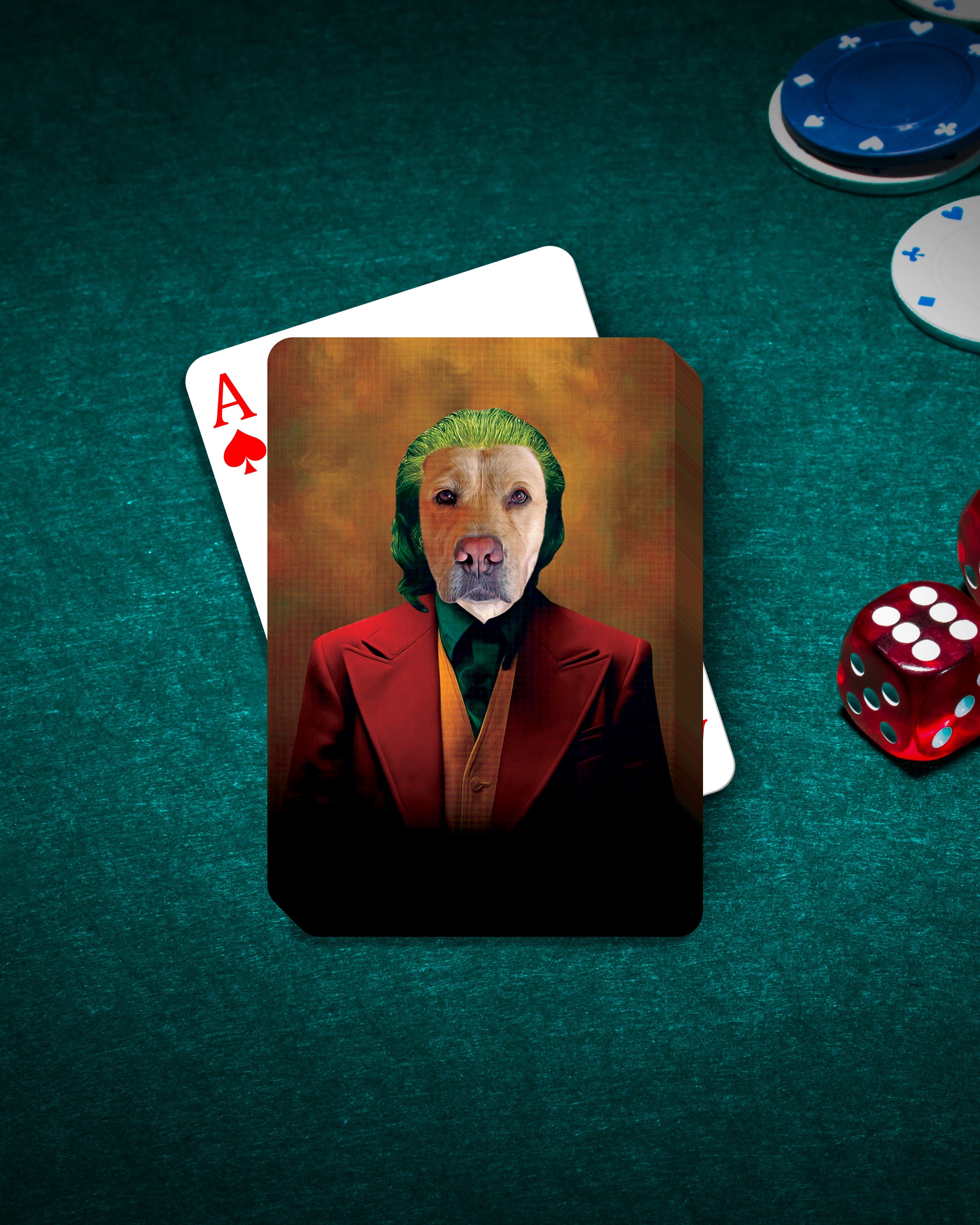Custom pet portrait playing card featuring a dog as The Joker, on a green felt table with poker chips and dice.