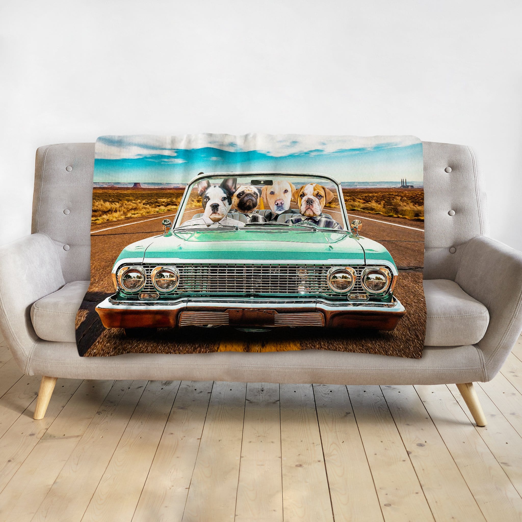Personalized pet blanket with four dogs in a vintage teal convertible on a desert road.