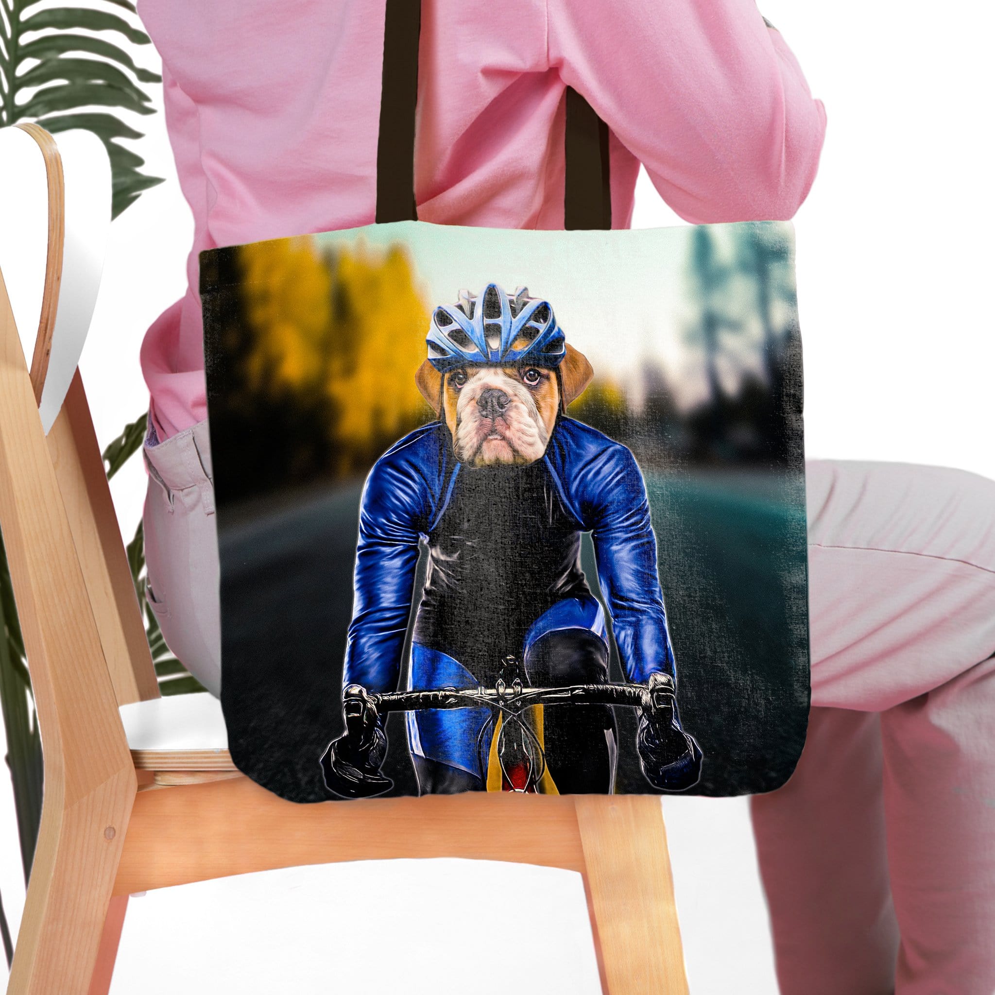 Personalized tote bag with a bulldog pet portrait in a male cyclist outfit.