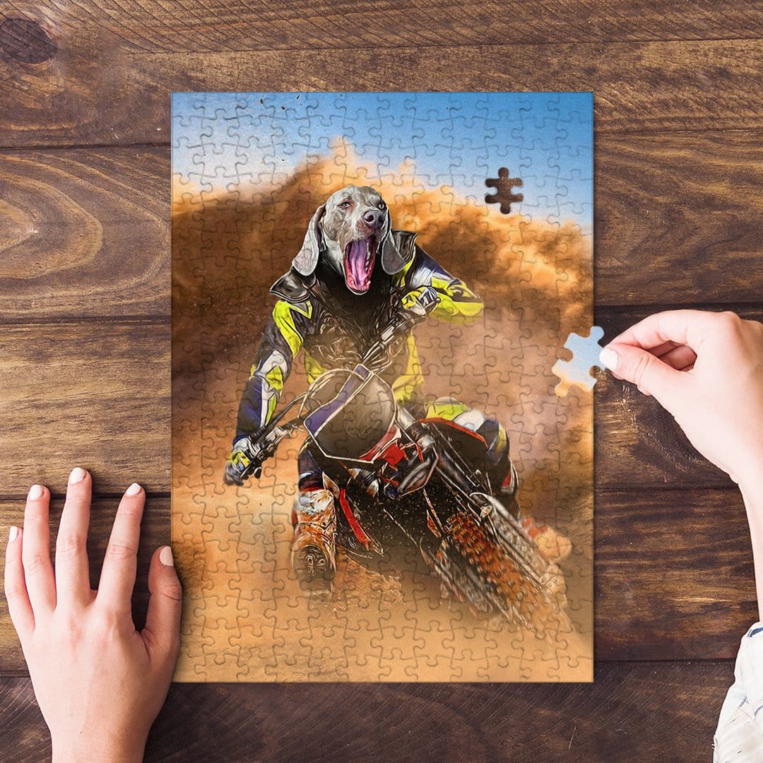 Personalized pet puzzle featuring a dog's head on a motocross rider, with a hand placing a piece.