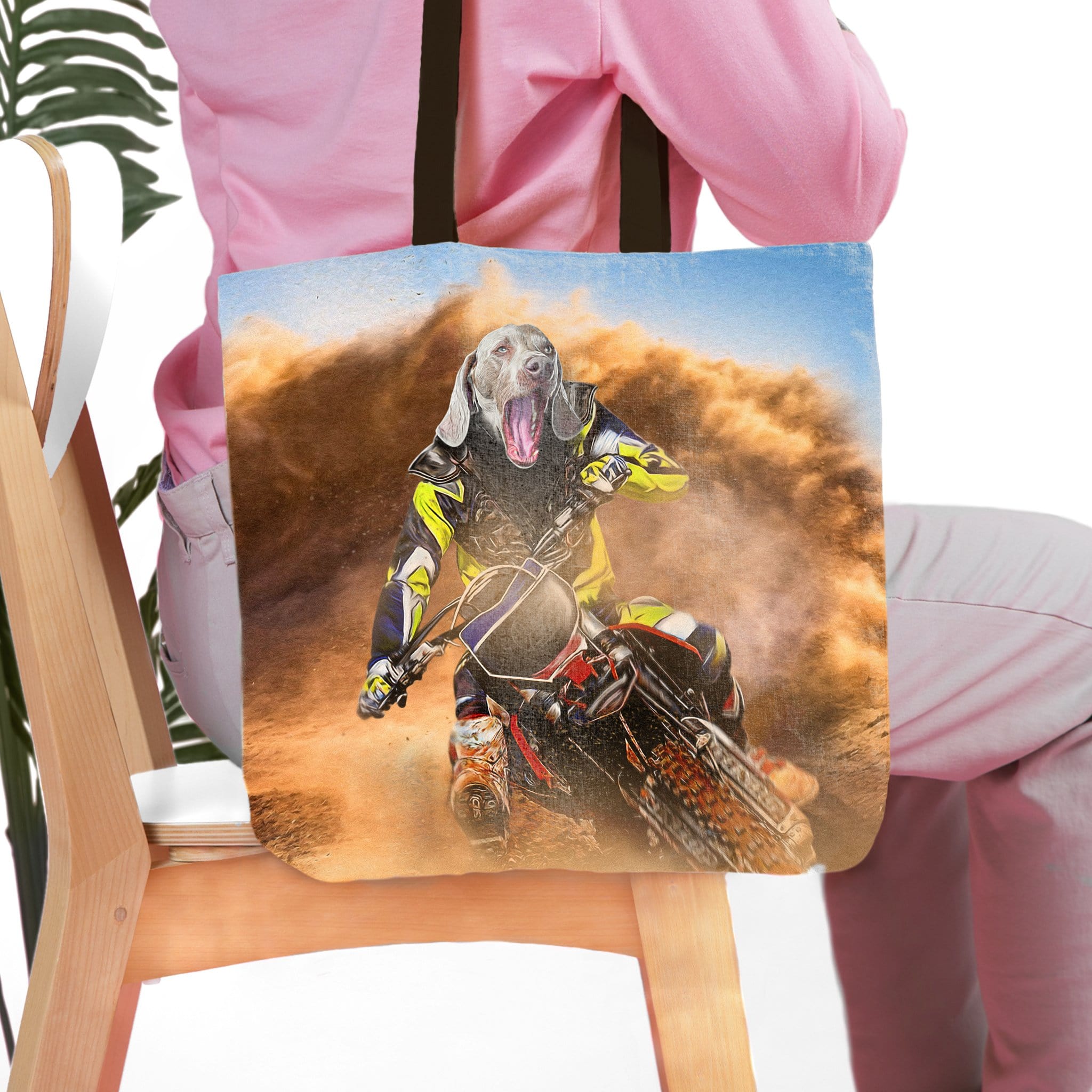 Personalized tote bag with a dog's head on a motocross rider in a dusty race.