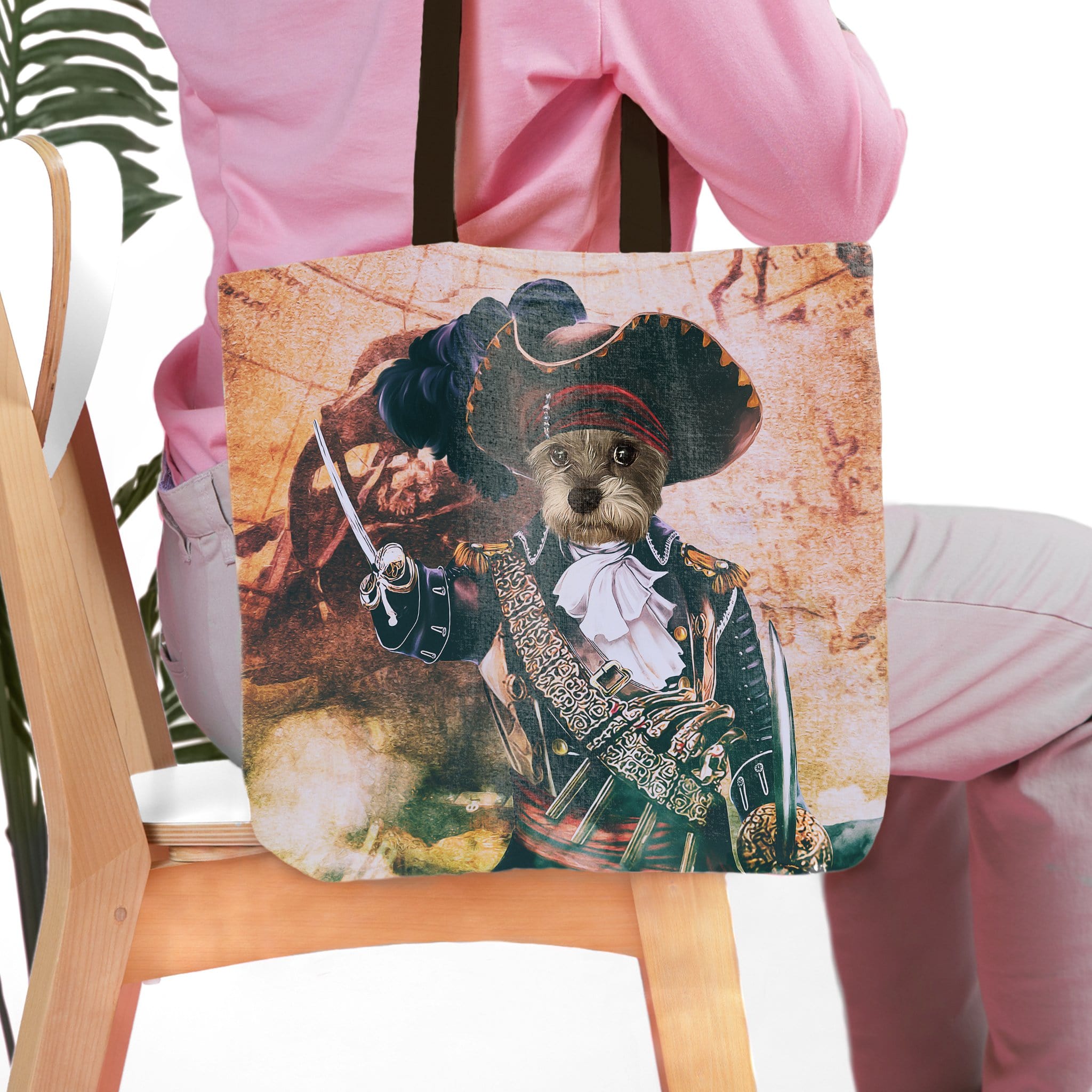 Personalized tote bag with a custom pet portrait of a dog dressed as a pirate, on a vintage map background.