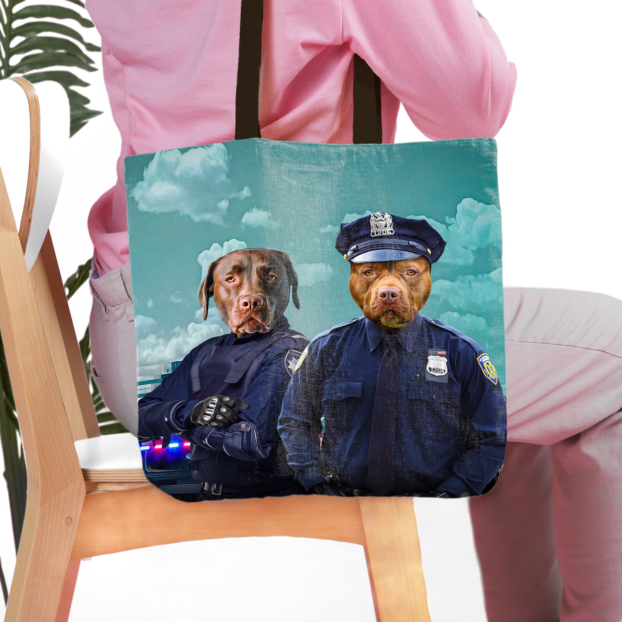 Personalized 2-pet tote bag featuring dog portraits as police officers on a blue sky background.