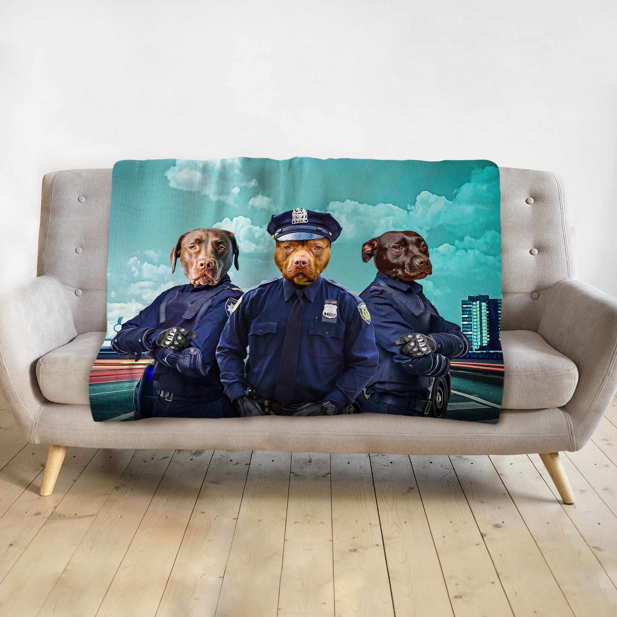 Personalized 3-pet blanket with dogs in police officer portraits against a city background.