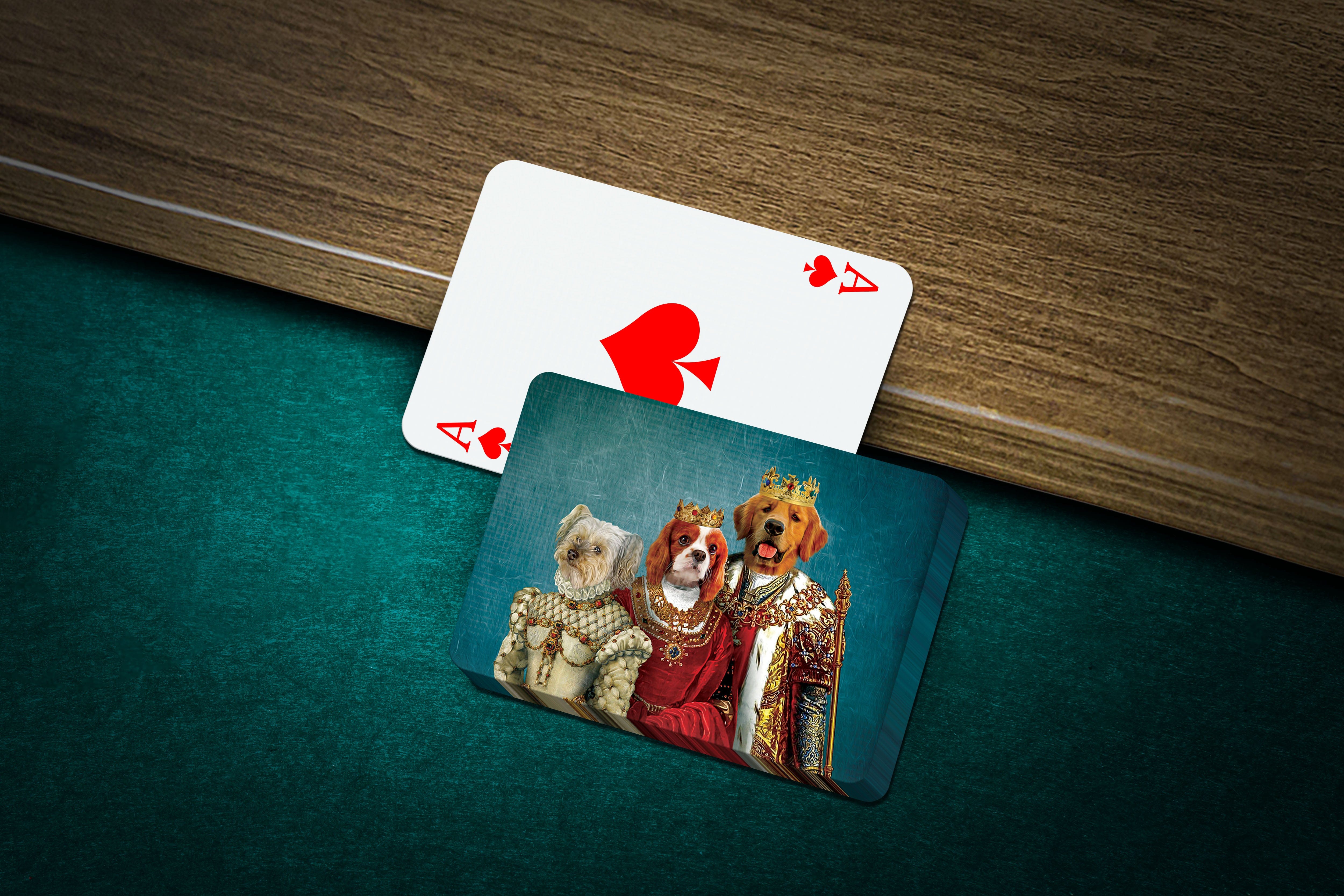 Personalized Royal Family playing cards featuring three dogs in renaissance costumes on a green felt table.