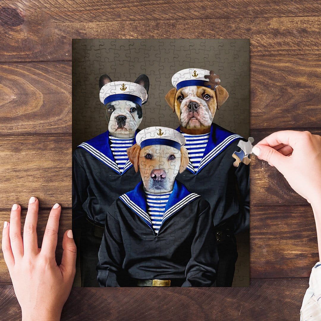 Personalized 3 pet puzzle featuring dogs dressed as sailors, with a hand placing a piece.