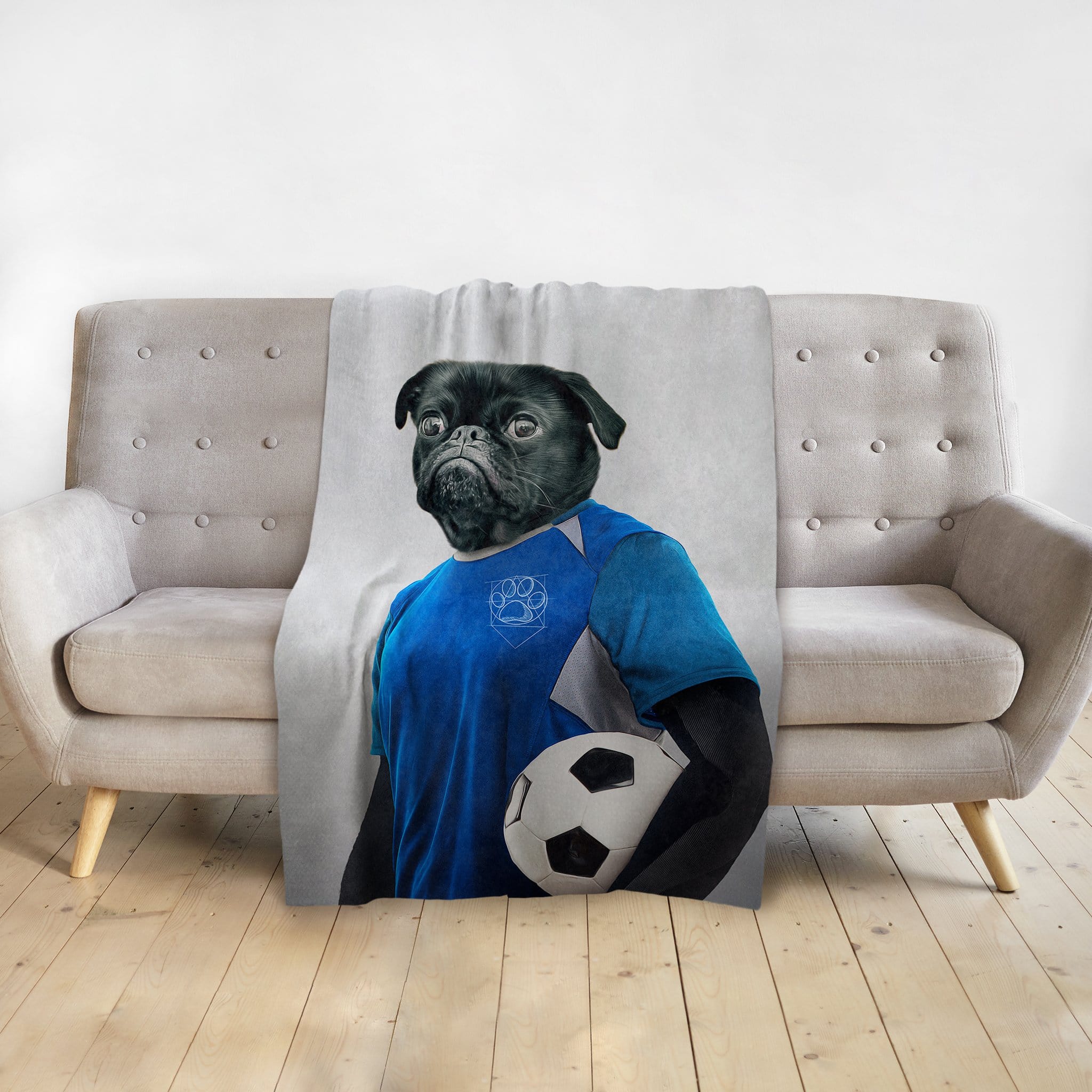 Personalized pet blanket with a black pug dog in a blue soccer uniform holding a ball.