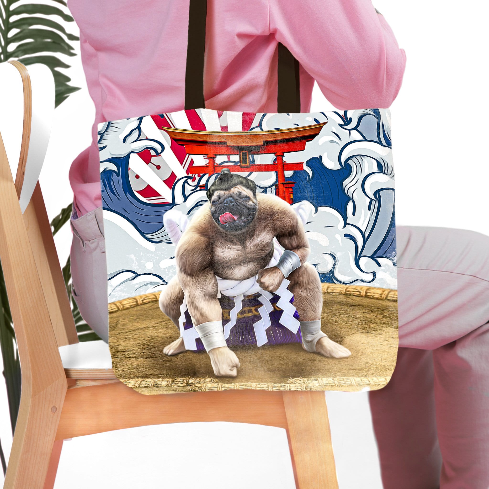 Personalized tote bag with a pug pet portrait as a sumo wrestler in a ring.