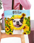 Personalized tote bag with a Boston Terrier pet portrait in a sunflower field, named "Millie".