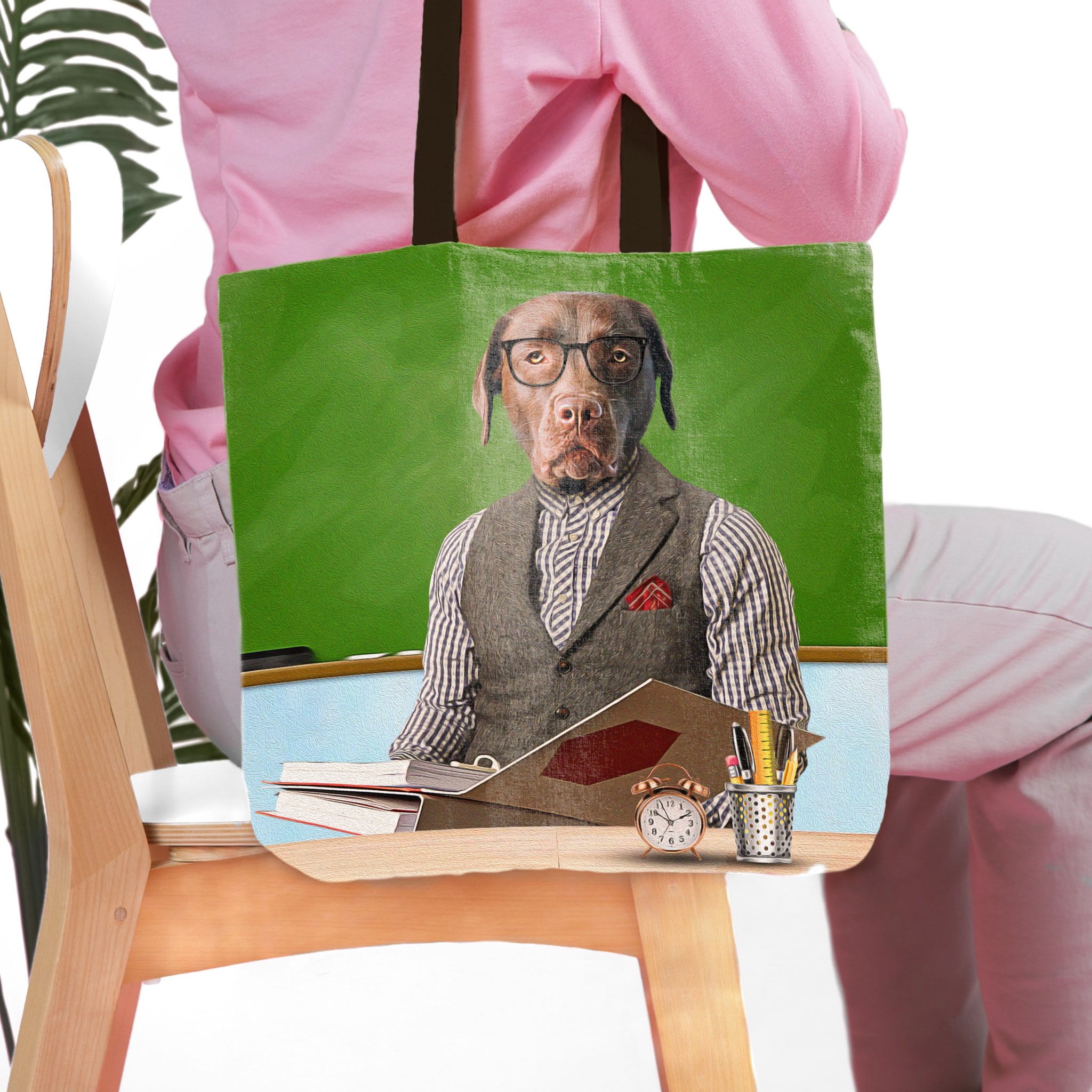 Personalized green tote bag with a custom pet portrait of a dog dressed as a teacher.