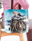 Personalized tote bag with a golden retriever pet portrait as a Viking warrior in a snowy landscape.