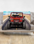 Personalized pet blanket with a bulldog driving a red Jeep on a desert road.