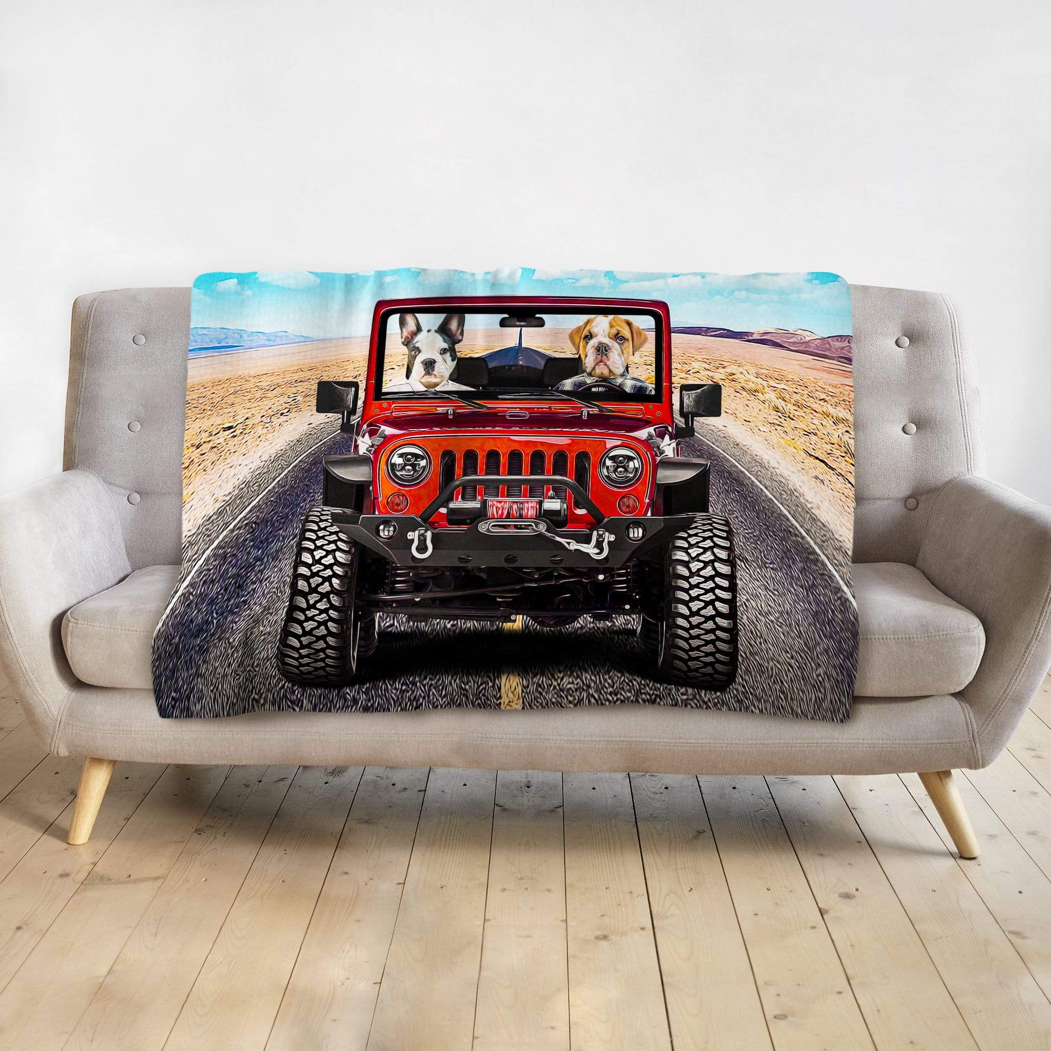 Personalized 2 pet blanket with custom dog portraits driving a red Jeep on a desert road.