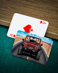 Personalized playing cards featuring two dogs in a red jeep, with an ace of spades card.