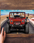 Personalized 2-pet puzzle featuring two dogs in a red jeep, with a hand placing a piece.