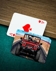 Personalized playing cards featuring four pets in a red jeep, on a green felt table.