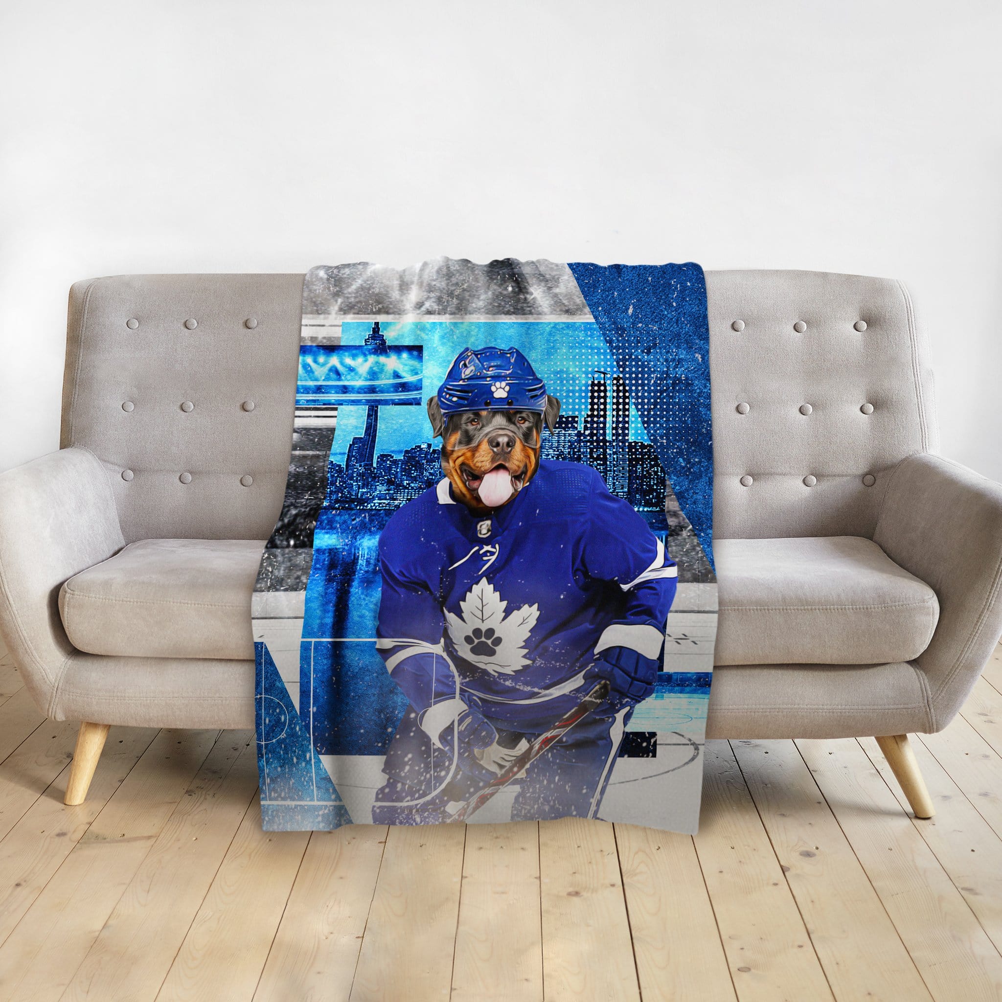 Custom pet blanket with a Rottweiler in a blue hockey uniform, Toronto skyline background.