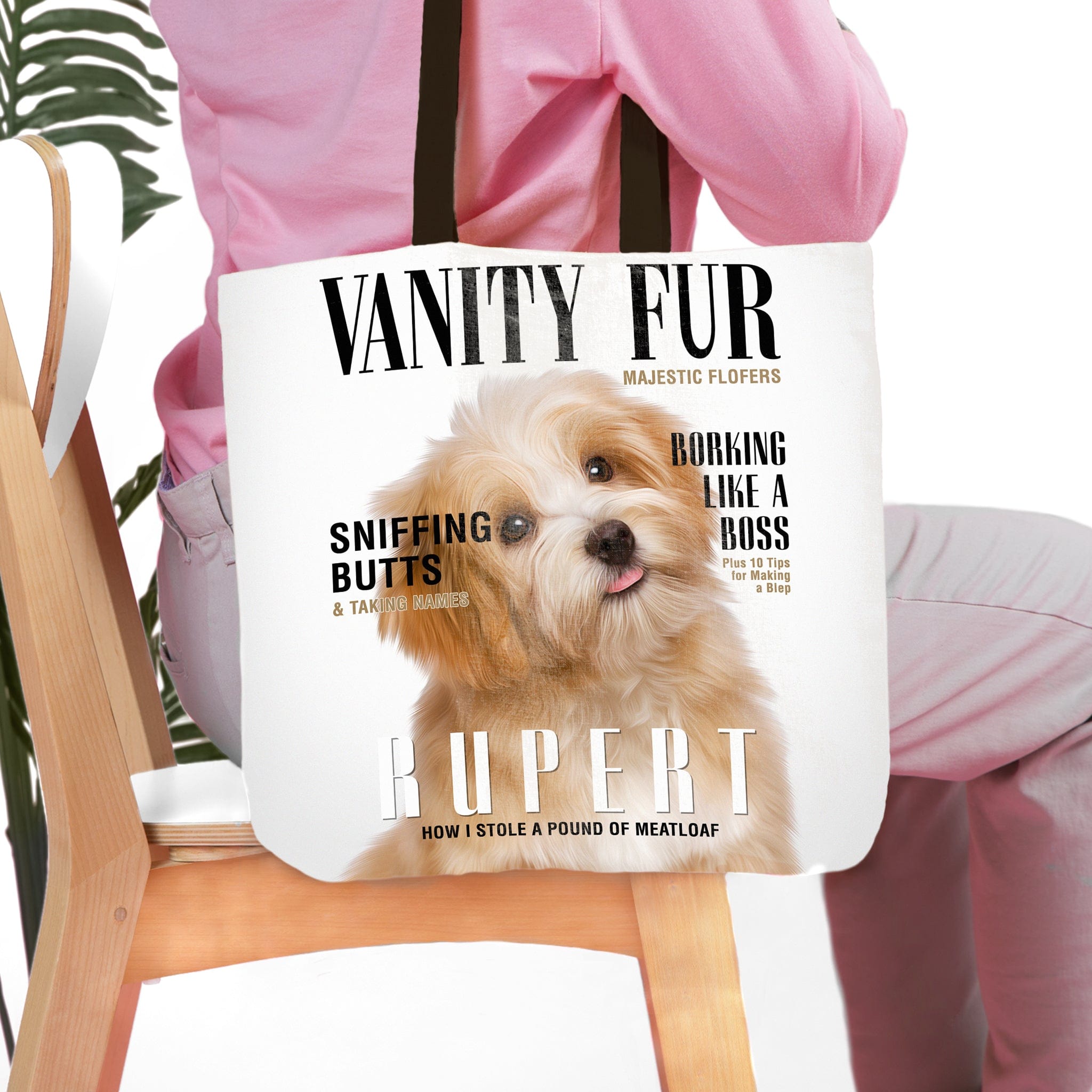 Personalized white canvas tote bag with a custom pet portrait of a fluffy dog in a magazine cover style.