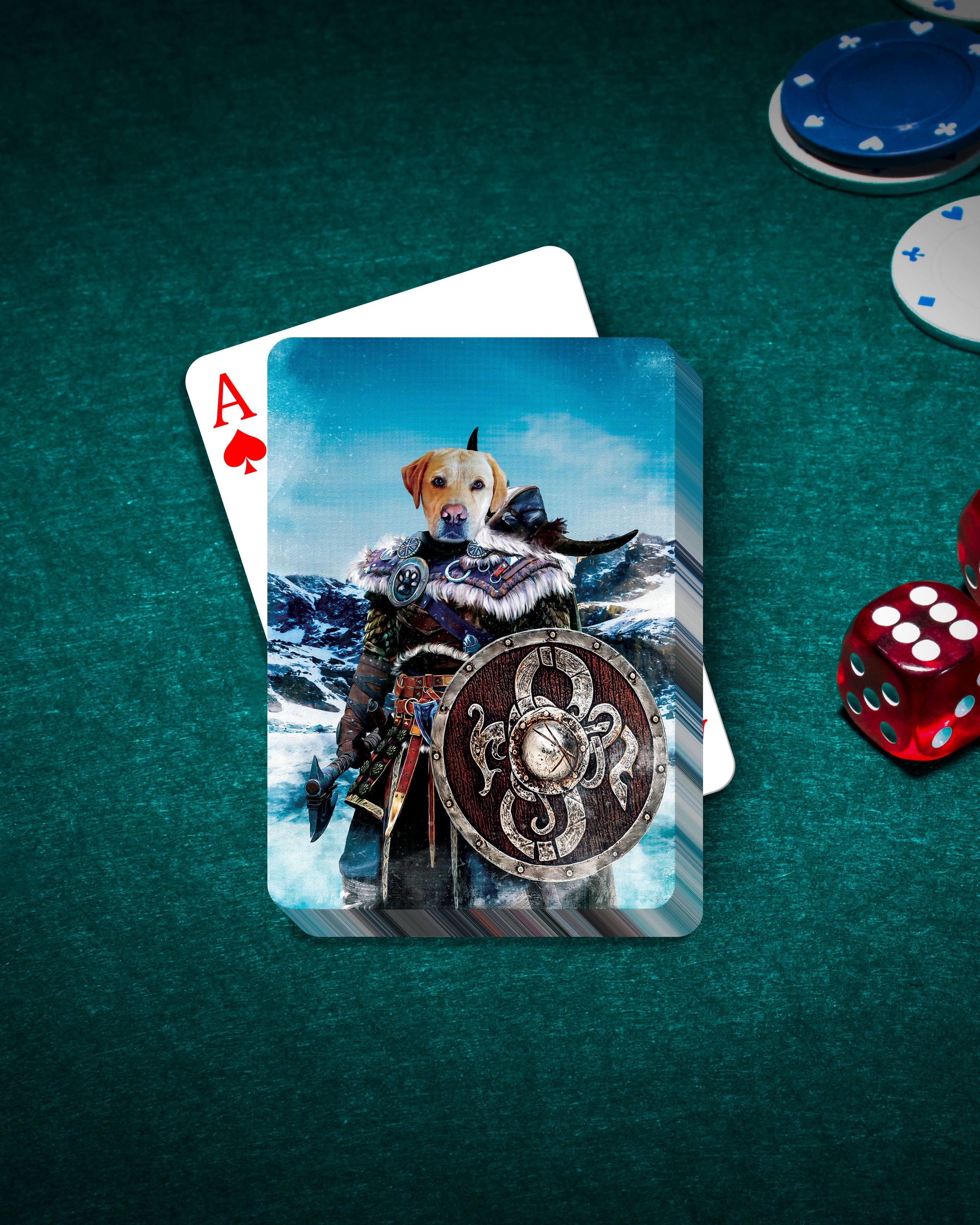 Personalized playing cards featuring a dog in a Viking warrior portrait on a green felt table with poker chips and dice.