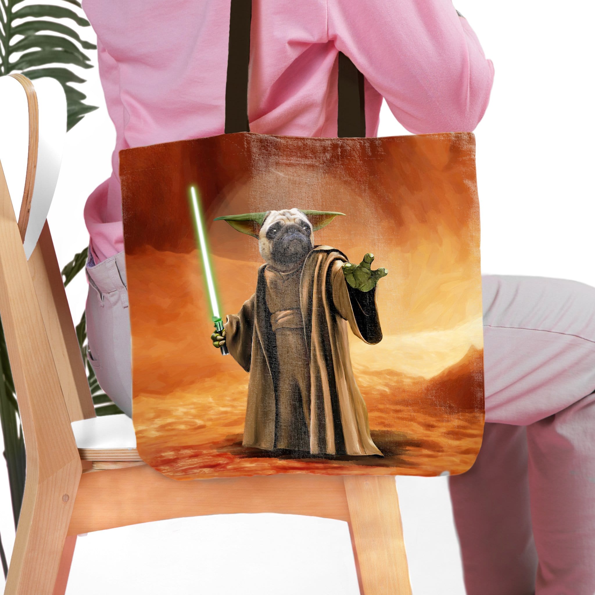 Personalized Yodogg tote bag featuring a pug pet portrait as a Jedi master with a green lightsaber.